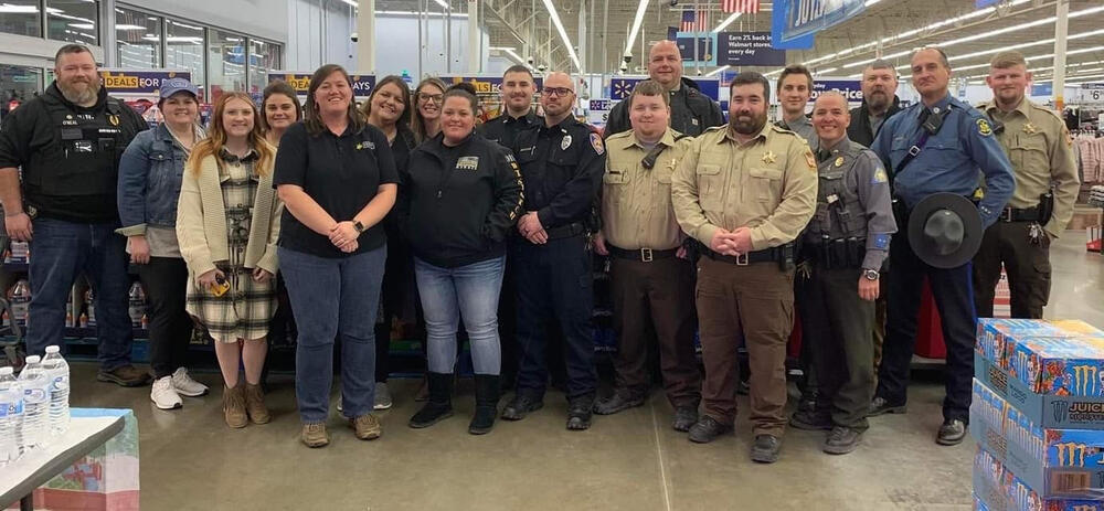 Shop with a Cop program staff.